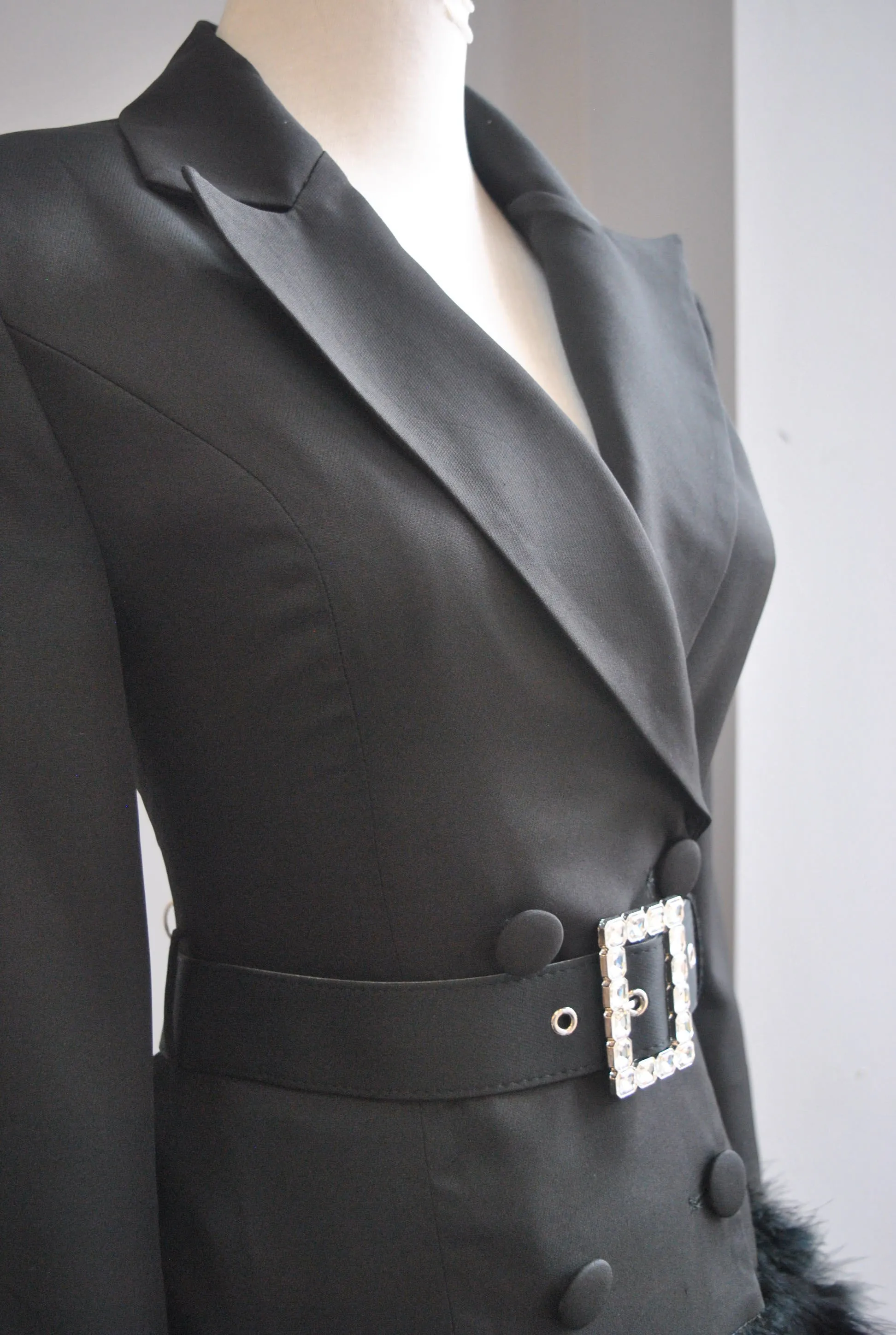 BLACK JACKET DRESS WITH A CRYSTAL BELT AND FEATHERS