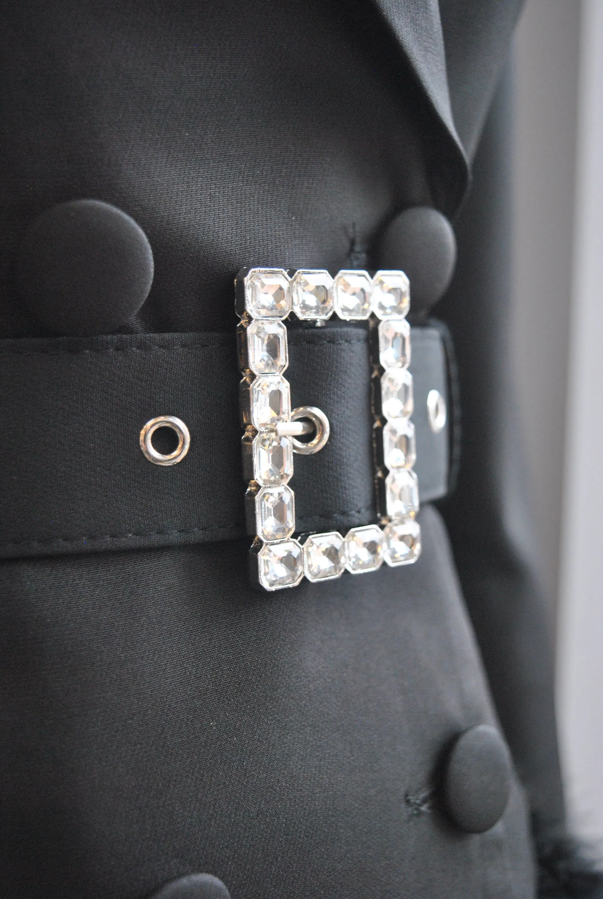 BLACK JACKET DRESS WITH A CRYSTAL BELT AND FEATHERS