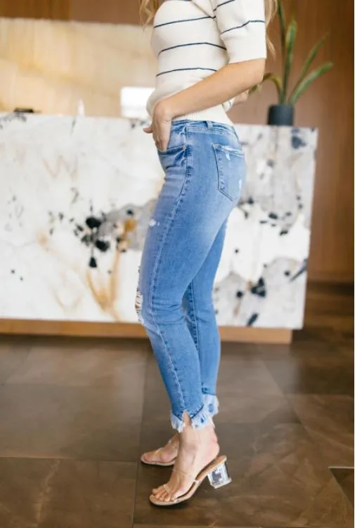 Distressed Mid Rise Skinny Jeans