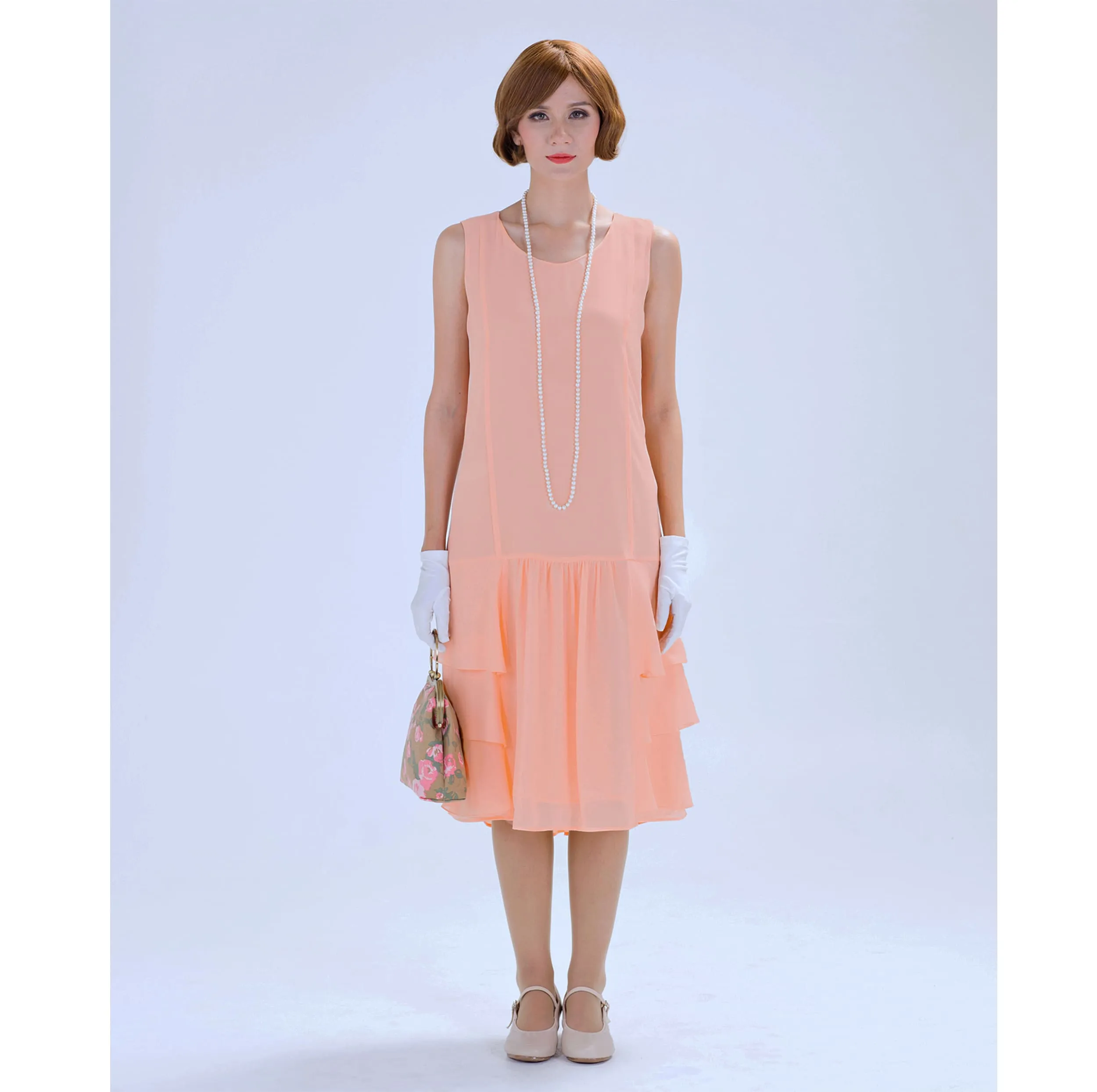 Peach 1920s chiffon dress with tiered skirt