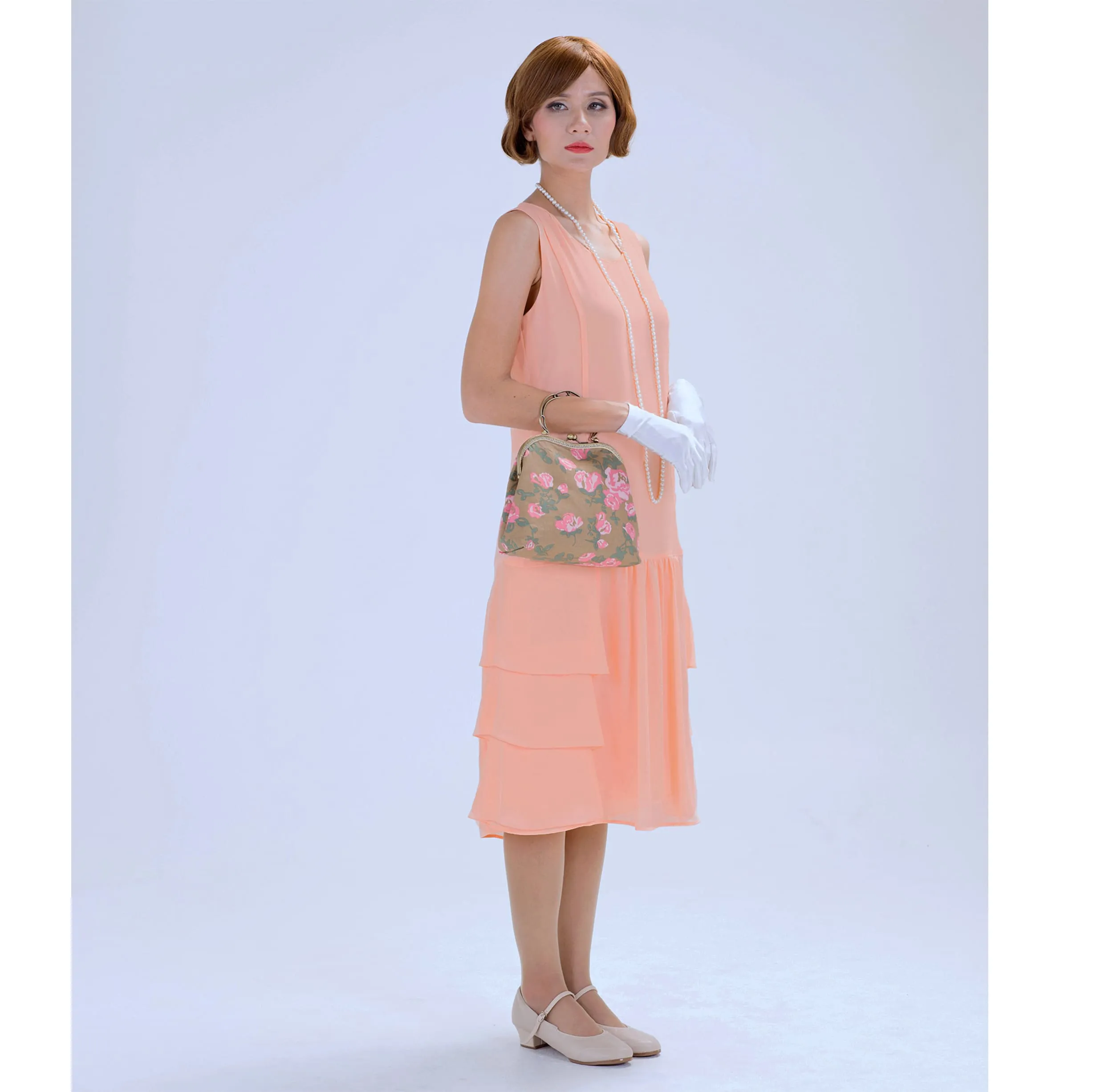 Peach 1920s chiffon dress with tiered skirt