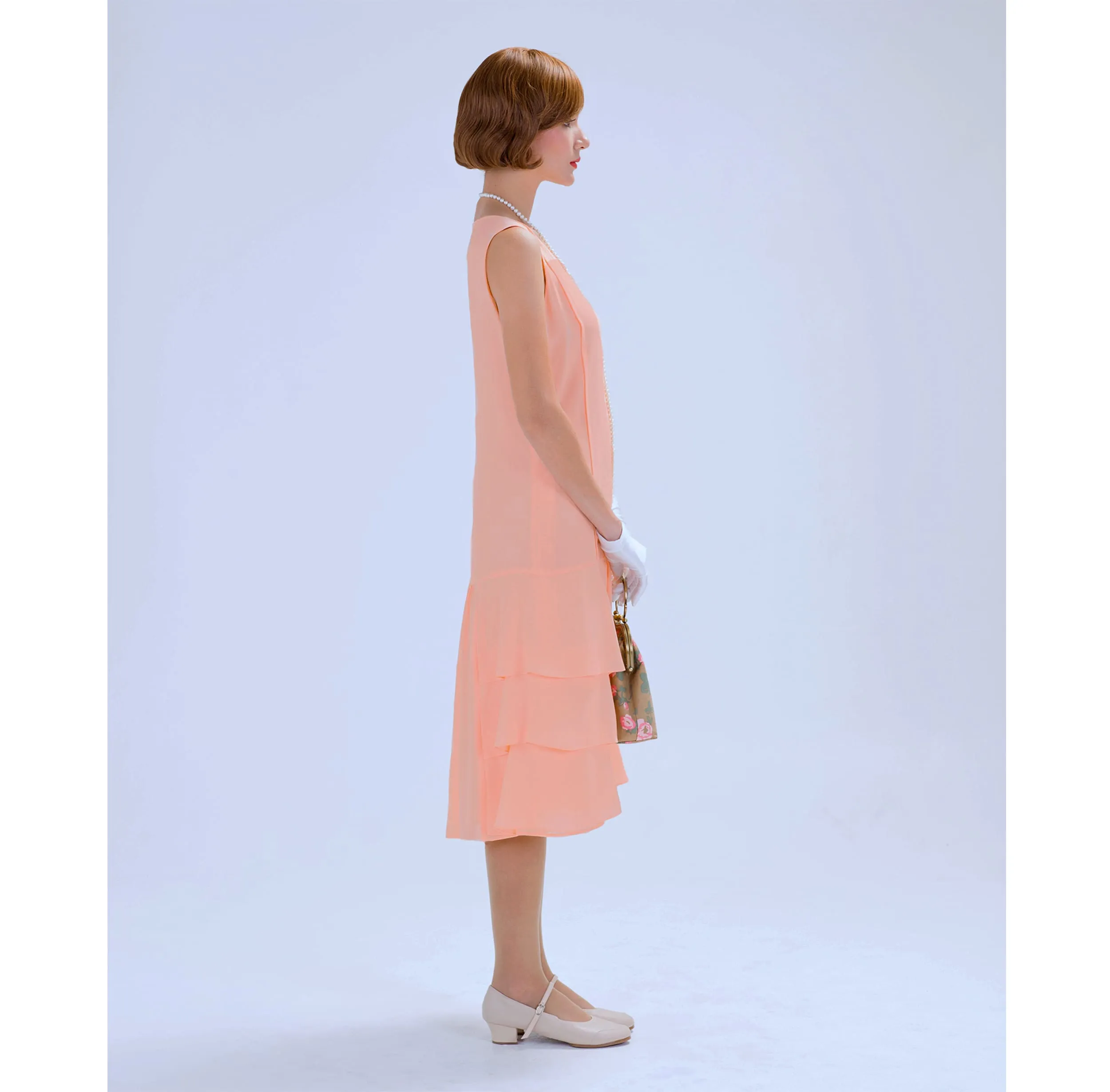 Peach 1920s chiffon dress with tiered skirt